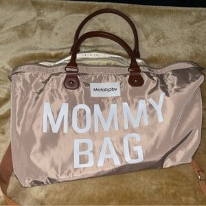 Labor and delivery tan mommy bag with diaper changing pad and toiletry bag